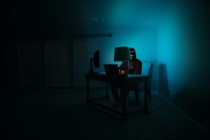 A hacker harvesting credentials through Phishing Attacks